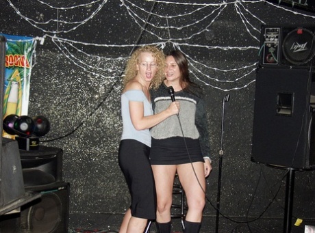 Ginger Klixen Engages In Lesbian Sex Inside A Dive Nightclub