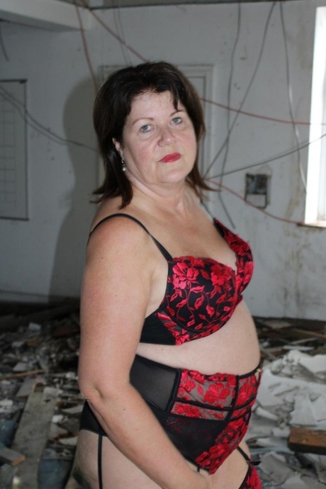 Mature British plumper Cassandra Uk models lingerie and nylons as well