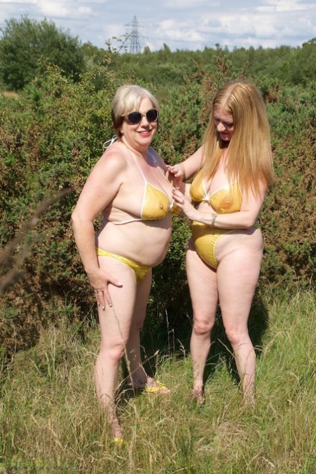 UK Lady Speedy Bee And Her Younger Lesbian Lover Fondle Each Other In Bikinis