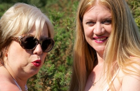 UK Lady Speedy Bee And Her Younger Lesbian Lover Fondle Each Other In Bikinis