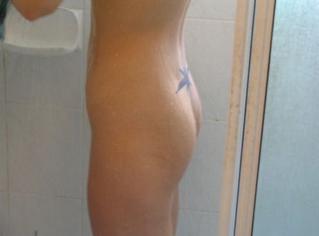 Blonde Teen Aussie Jewel Fondles Her Enhanced Tits Before Taking A Shower