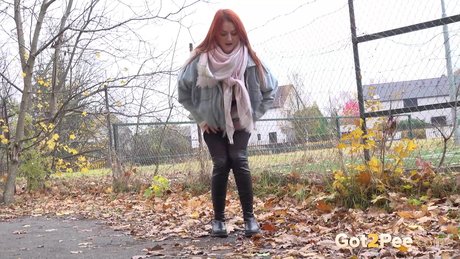 Pale Redhead Katy Rose Gets Caught Taking A Pee On Leaves During The Day