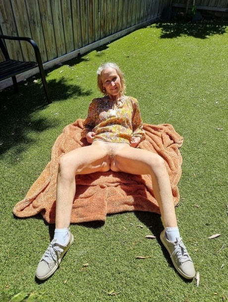 Old Blonde Woman Jacqueline Goes Nude On A Blanket In Socks And Running Shoes
