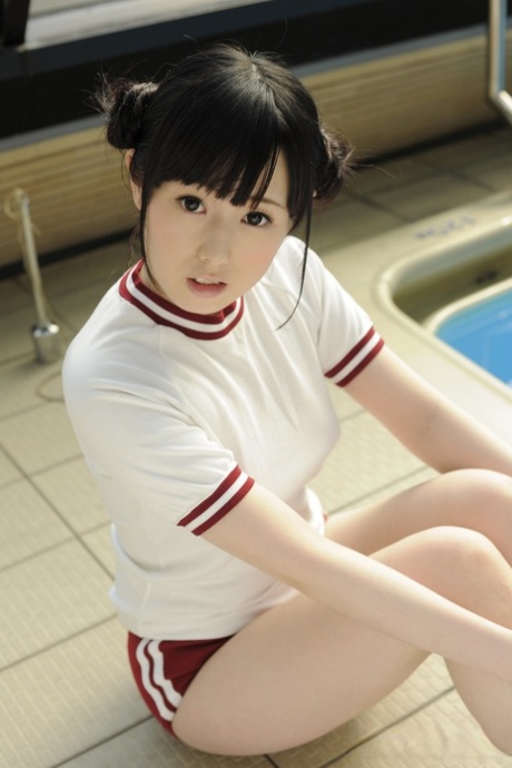 Adorable Japanese Girl Machiko Ono Uncovers Her Firm Tits Near An Indoor Pool 12649973