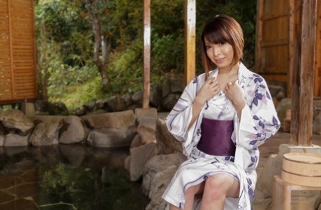 Japanese Babe Hikaru Kirishima Removes Her Kimono Before Getting In A Hot Tub