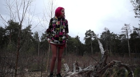 Solo Girl With Pink Hair Vasya Takes A Pee Over The Top Of Some Windfall