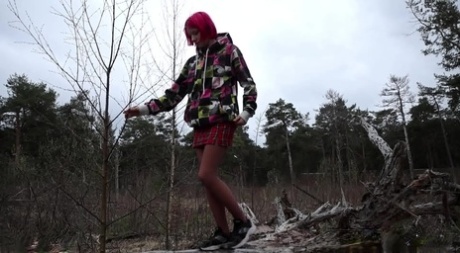 Solo Girl With Pink Hair Vasya Takes A Pee Over The Top Of Some Windfall