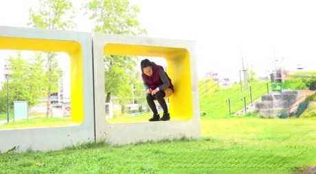 Lara Fox Squats For A Badly Needed Piss Upon A Public Art Installation