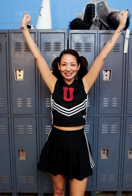 Dressed in a full-skirt upskirt, the Asian MILF Coco Velvet is dressed to be an active cheerleader.