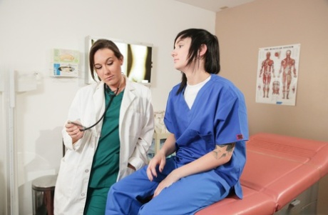 In a clinic, Nikki Hearts has had lesbian sex with her doctor Sinn Sage.