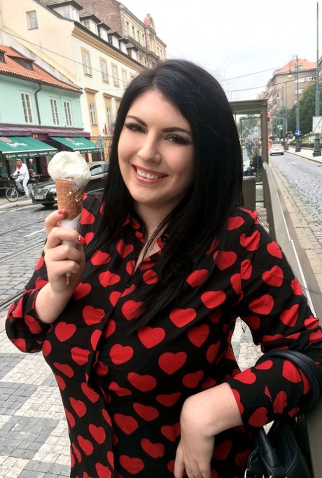 Chubby brunette chick Maya Milano eats and ice cream cone in teasing manner