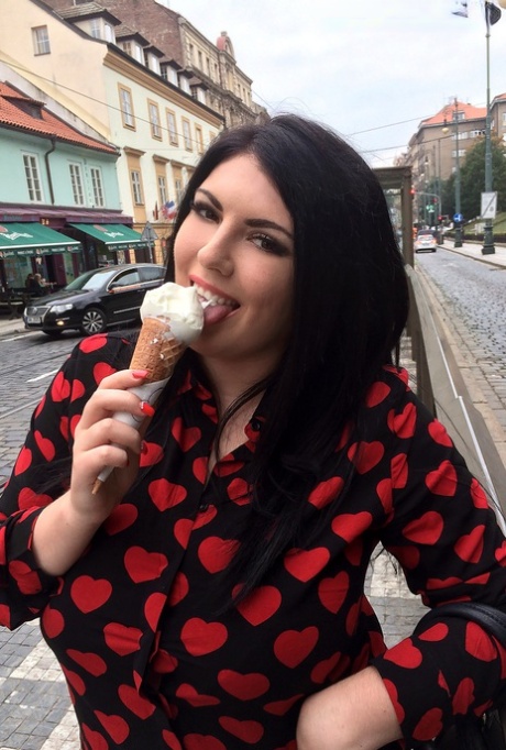 Chubby brunette chick Maya Milano eats and ice cream cone in teasing manner