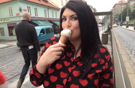 Chubby brunette chick Maya Milano eats and ice cream cone in teasing manner