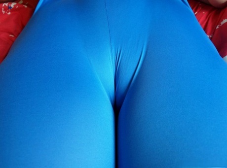 An older woman named Daniella English can be seen wearing spandex pants while swishing them over her big buttocks.