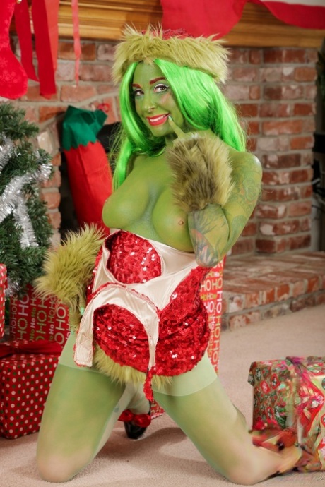 Solo model Joanna Angel showing off pussy and asshole dressed as Green Lady