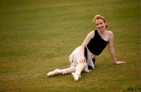 Natural redhead Nicki Blue works on her ballerina moves in an extensive field (file picture) She is a natural performer and dancer with the stars.