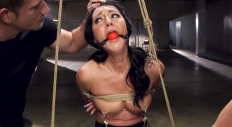 Brunette chick is restrained and gagged before being masturbated and fucked