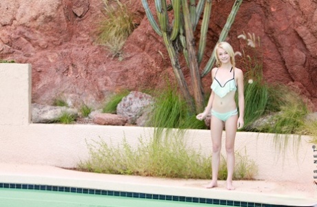 Young Blonde Maddy Rose Poses In A Bikini During A Poolside Solo Shoot