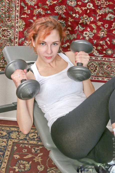 Natural Redhead Sophia Jeneu Pumps Iron Before Getting Naked On A Trampoline