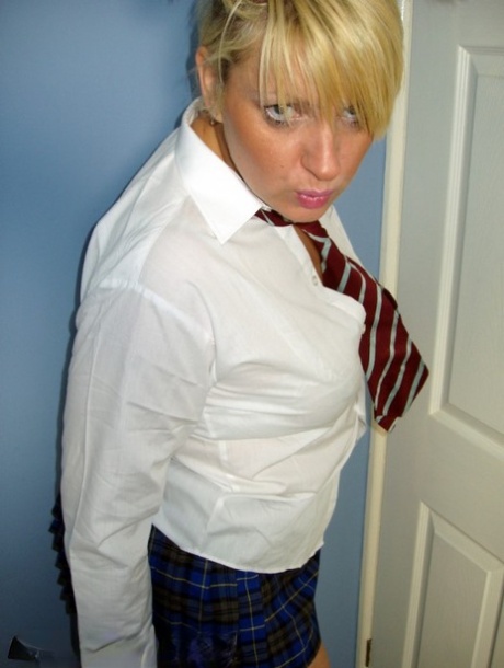 In her schoolgirl attire, Daniella English, an older British amateur, slips off.