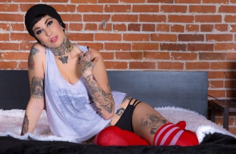 Tattooed Girl Aayla Secura Showcases Her Bald Twat In Striped Thigh High Socks