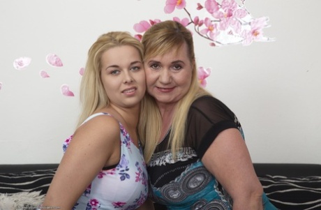 Overweight mature lesbian and her teen lover scissor vaginas on sofa - PornHugo.net