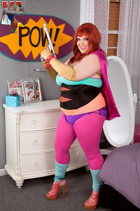 Red-headed fatty cat Kitty Mcpherson releases her big boobs from cosplay costumes.