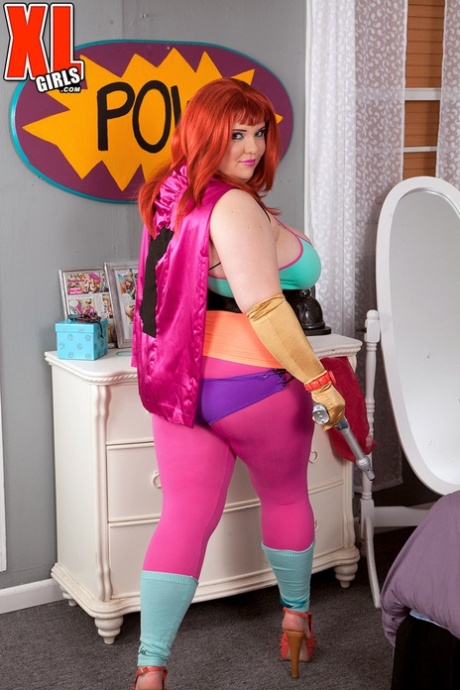 Cosplay attire releases redheaded fatty Kitty Mcpherson's large breasts.