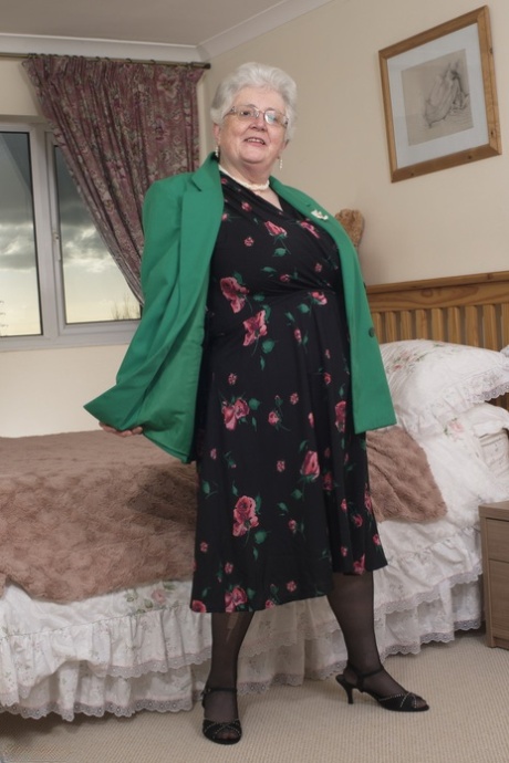 Older Granny Is Still Horny And Plays With Her Fatty Pussy On The Bed