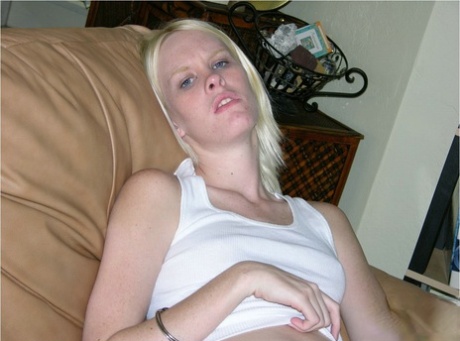 Blonde Amateur In Shit Kicker Boots Tales Of Hr Clothes To Pose Nude On Sofa