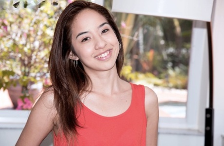 Asian teen Mila Jade is stripped naked before being banged from behind