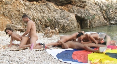Things Heat Up At The Beach When A Sizzling Naked Orgy Leads To DP