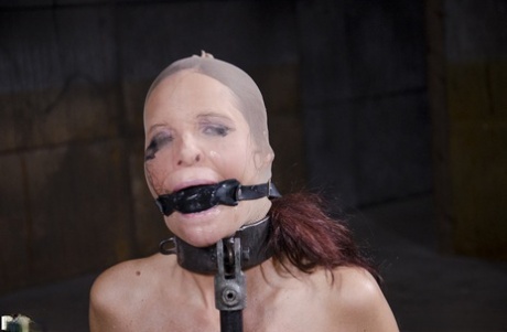 Female slave Syren de Mer has her mouth sucked with the assistance of a nylon.