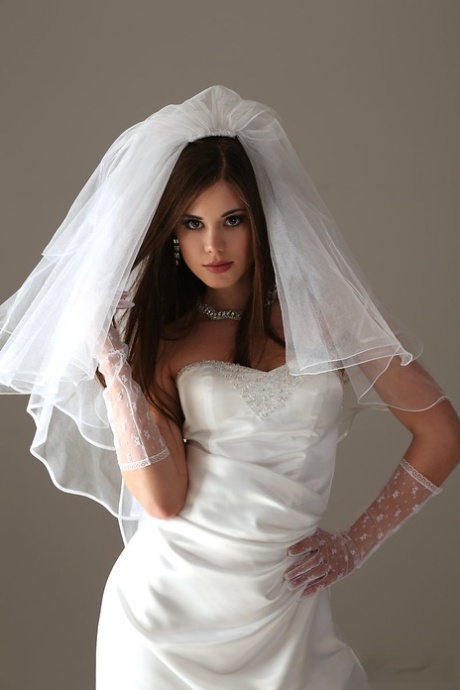 Glamour model Little Caprice strips off her wedding dress