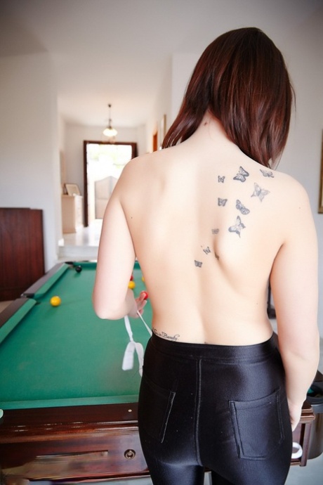 Hot Helen G puts on a skin-tight topless outfit for the pool table.