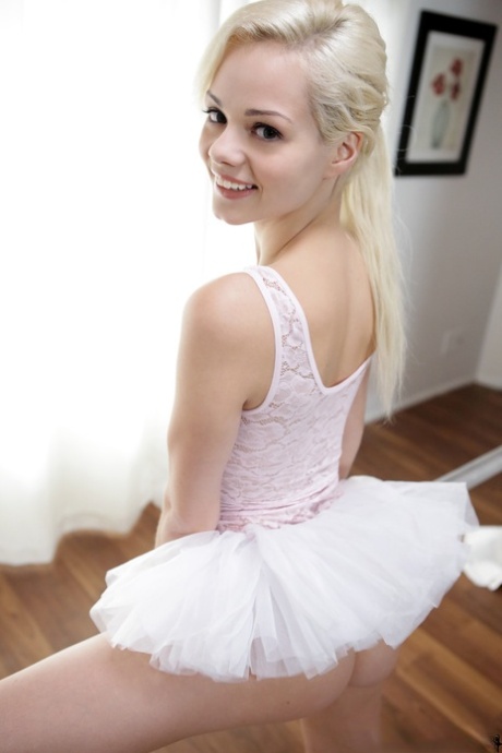 Hot, sexy blonde girl Elsa Jean wearing ballet gear spreading her pussy across the room.