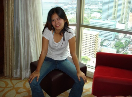 Following a POV blowjob, Cindy (an amateur Filipina) dribbles down her chin in jest.