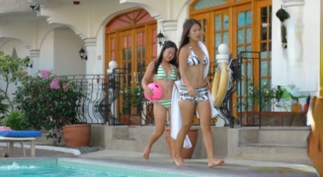 The Filipina sisters, Nicole and Anne (left) dribble in bikinis before the POV threesome for a fuck.