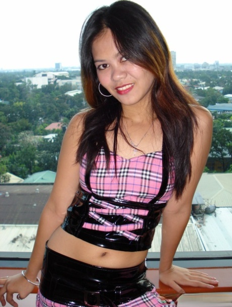 Cute Filipina Chick Bends Over For A No Panty Upskirt In Black Boots