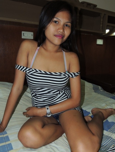 The Filipina cutie exhibits her breastbone in a motel room as part of a sexual encounter with a sex tourist.