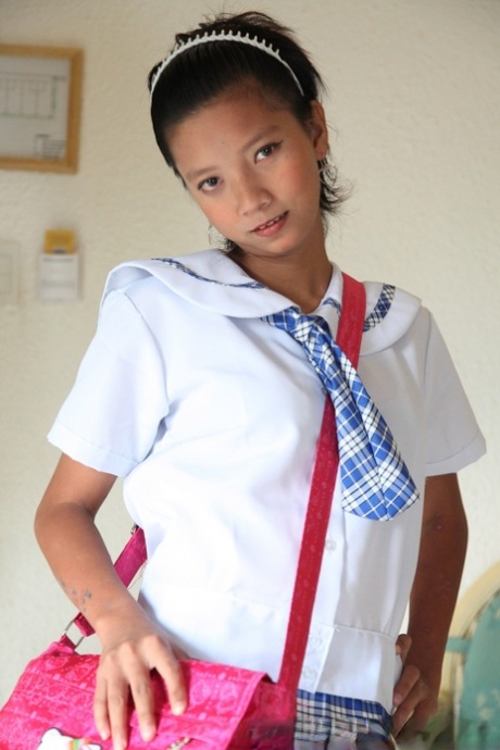 Adorable Asian Schoolgirl Sally Slides Her Cute Panties Aside To Show Her Twat