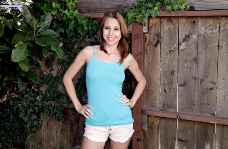 Sweet Young Girl Cece Capella Gets Totally Naked Near A Backyard Fence
