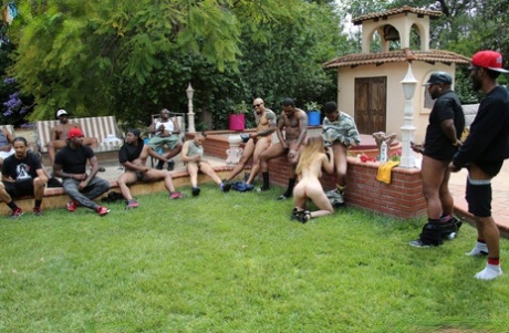 In an outdoor bukakke festivity, Stella Cox from the white slut team up with other black men to enjoy some fun.
