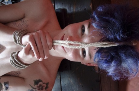 Skinny chick Billy Nix endures being tied up with rope and used as sex slave