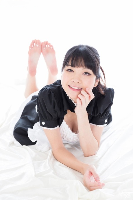 An entire year after being given a handjob, the Japanese maid removes the Sperm from her fingers by licking it all over.