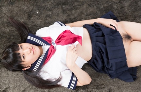 Cute Japanese Schoolgirl Bares Her Pussy Before Getting Cum On Face After A HJ