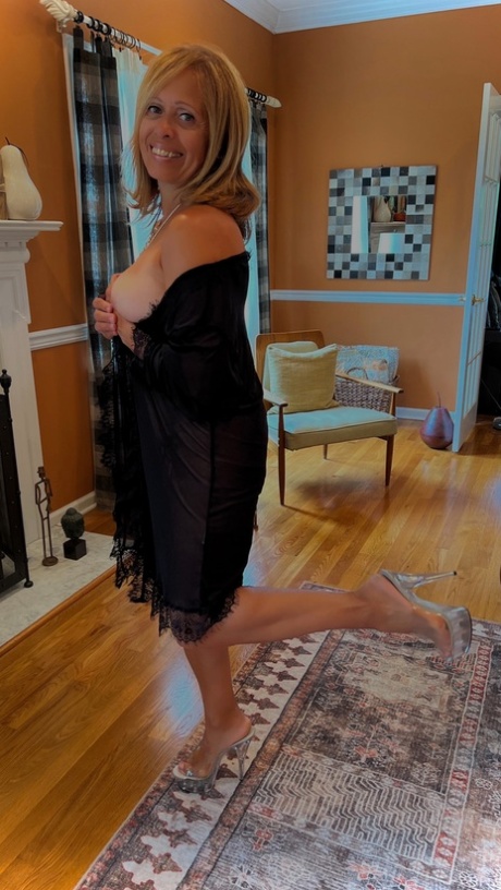 Naughty MILF Shows Her Saggy Tits While Teasing In Black Lingerie & High Heels