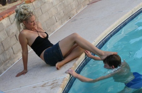 Foot Fetish Subs Worship Legs Of A Femdom Bitch In A Skirt By A Pool