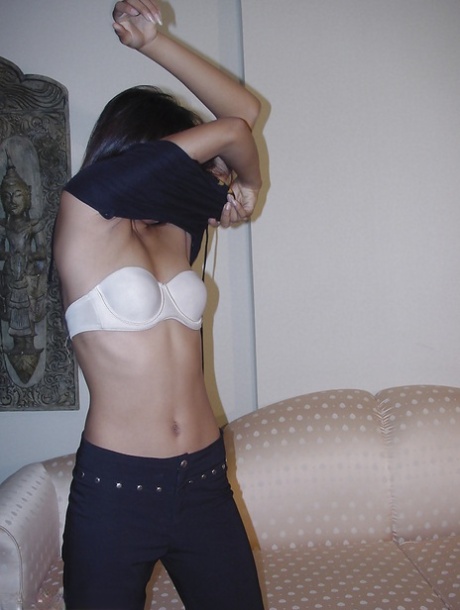 With a slim and steamy Asian woman, she is seen playing with herself while being nude.