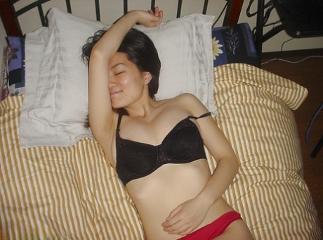 A gorgeous Asian female named Ball is enjoying her big, strong bristols.